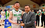 15 August 2021; Jordan Blount of Ireland is presented with his All Star award by FIBA Technical Delegate Stefan Laimer after the FIBA Men’s European Championship for Small Countries day five match between Ireland and Malta at National Basketball Arena in Tallaght, Dublin. Photo by Eóin Noonan/Sportsfile