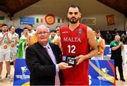15 August 2021; Aaron Falzon of Malta is presented with his All Star award by FIBA Commissioner Robert Bald during the FIBA Men’s European Championship for Small Countries day five match between Ireland and Malta at National Basketball Arena in Tallaght, Dublin. Photo by Eóin Noonan/Sportsfile