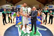 15 August 2021; Ireland captain Jason Killeen is presented with the cup by President of Basketball Ireland PJ Reidy after the FIBA Men’s European Championship for Small Countries day five match between Ireland and Malta at National Basketball Arena in Tallaght, Dublin. Photo by Eóin Noonan/Sportsfile