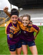 15 August 2021; Wexford players Catriona Murray, left, and Anne Byrne celebrate after their side's victory in the TG4 All-Ireland Intermediate Ladies Football Championship Semi-Final match between Laois and Wexford at UPMC Nowlan Park in Kilkenny. Photo by Piaras Ó Mídheach/Sportsfile
