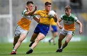 15 August 2021; Daire Cregg of Roscommon in action against Cathal Donoghue, left, and Aaron Brazil of Offaly during the 2021 Eirgrid GAA Football All-Ireland U20 Championship Final match between Roscommon and Offaly at Croke Park in Dublin. Photo by Stephen McCarthy/Sportsfile