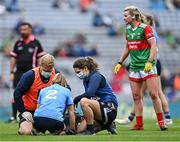 14 August 2021; Martha Byrne of Dublin receives medial attention from team doctor Noëlle Healy and team physio Sé Caffrey during the TG4 Ladies Football All-Ireland Championship semi-final match between Dublin and Mayo at Croke Park in Dublin. Photo by Piaras Ó Mídheach/Sportsfile