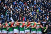 14 August 2021; Supporters in the Hogan Stand and Mayo players stand for Amhrán na bhFiann before the GAA Football All-Ireland Senior Championship semi-final match between Dublin and Mayo at Croke Park in Dublin. Photo by Piaras Ó Mídheach/Sportsfile