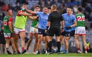 14 August 2021; Brian Howard of Dublin in conversation with referee Conor Lane during the GAA Football All-Ireland Senior Championship semi-final match between Dublin and Mayo at Croke Park in Dublin. Photo by Piaras Ó Mídheach/Sportsfile