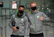 18 August 2021; Shamrock Rovers players Danny Mandroiu, left, and Liam Scales at Dublin Airport prior to their team's departure to Estonia for their UEFA Europa Conference League Play-Off First Leg match against Flora Tallinn. Photo by Stephen McCarthy/Sportsfile