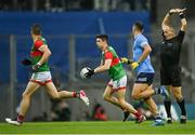 14 August 2021; Referee Conor Lane steps out of the way as Conor Loftus of Mayo goes on the attack during the GAA Football All-Ireland Senior Championship semi-final match between Dublin and Mayo at Croke Park in Dublin. Photo by Piaras Ó Mídheach/Sportsfile