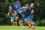 19 August 2021; Nick McCarthy is tackled by Seán Cronin and Devin Toner during Leinster Rugby squad training at UCD in Dublin. Photo by Brendan Moran/Sportsfile