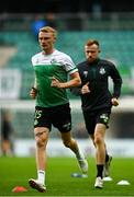 19 August 2021; Liam Scales of Shamrock Rovers, left, and team-mate Sean Hoare warm up before the UEFA Europa Conference League play-off first leg match between Flora Tallinn and Shamrock Rovers at A. Le Coq Arena in Tallinn, Estonia Photo by Eóin Noonan/Sportsfile