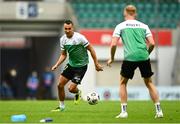 19 August 2021; Graham Burke of Shamrock Rovers, left, warms up with team-mate Liam Scale before the UEFA Europa Conference League play-off first leg match between Flora Tallinn and Shamrock Rovers at A. Le Coq Arena in Tallinn, Estonia Photo by Eóin Noonan/Sportsfile