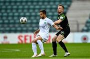 19 August 2021; Rauno Sappinen of Flora Tallinn in action against Sean Hoare of Shamrock Rovers during the UEFA Europa Conference League play-off first leg match between Flora Tallinn and Shamrock Rovers at A. Le Coq Arena in Tallinn, Estonia Photo by Eóin Noonan/Sportsfile