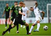 19 August 2021; Rory Gaffney of Shamrock Rovers in action against Sergei Zenjov of Flora Tallinn during the UEFA Europa Conference League play-off first leg match between Flora Tallinn and Shamrock Rovers at A. Le Coq Arena in Tallinn, Estonia Photo by Eóin Noonan/Sportsfile