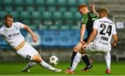 19 August 2021; Rory Gaffney of Shamrock Rovers has a shot on goal but it is blocked by Markkus Seppik of Flora Tallinn during the UEFA Europa Conference League play-off first leg match between Flora Tallinn and Shamrock Rovers at A. Le Coq Arena in Tallinn, Estonia Photo by Eóin Noonan/Sportsfile