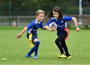 20 August 2021; Aoife Kirby in action against Harry Snee during the Bank of Ireland Leinster Rugby Summer Camp at North Kildare RFC in Kilcock, Kildare. Photo by Piaras Ó Mídheach/Sportsfile