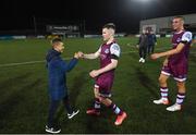 20 August 2021; Conor Kane of Drogheda United with Alex Conroy, son of the late Drogheda United coach David Conroy, who passed away on Thursday following a tragic accident, after the SSE Airtricity League Premier Division match between Dundalk and Drogheda United at Oriel Park in Dundalk, Louth. Photo by Stephen McCarthy/Sportsfile Photo by Stephen McCarthy/Sportsfile