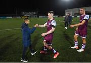 20 August 2021; Conor Kane of Drogheda United with Alex Conroy, son of the late Drogheda United coach David Conroy, who passed away on Thursday following a tragic accident, after the SSE Airtricity League Premier Division match between Dundalk and Drogheda United at Oriel Park in Dundalk, Louth. Photo by Stephen McCarthy/Sportsfile