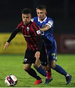 20 August 2021; Dylan Grimes of Longford Town in action against Darragh Power of Waterford during the SSE Airtricity League Premier Division match between Waterford and Longford Town at RSC in Waterford. Photo by Michael P Ryan/Sportsfile