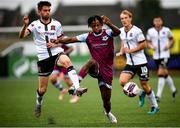 20 August 2021; Jordan Adeyemo of Drogheda United in action against Sam Stanton of Dundalk during the SSE Airtricity League Premier Division match between Dundalk and Drogheda United at Oriel Park in Dundalk, Louth. Photo by Stephen McCarthy/Sportsfile