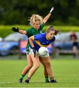 21 August 2021; Alanna Conroy of Wicklow in action against Róisín Ambrose of Limerick during the TG4 All-Ireland Ladies Football Junior Championship Semi-Final match between Wicklow and Limerick at Joe Foxe Memorial Park, Tang GAA Club in Westmeath. Photo by Ray McManus/Sportsfile