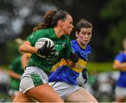 21 August 2021; Amy Ryan of Limerick in action against Aoife Gillen of Wicklow during the TG4 All-Ireland Ladies Football Junior Championship Semi-Final match between Wicklow and Limerick at Joe Foxe Memorial Park, Tang GAA Club in Westmeath. Photo by Ray McManus/Sportsfile