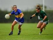 21 August 2021; Clodagh Fox of Wicklow in action against Charlotte Walsh of Limerick during the TG4 All-Ireland Ladies Football Junior Championship Semi-Final match between Wicklow and Limerick at Joe Foxe Memorial Park, Tang GAA Club in Westmeath. Photo by Ray McManus/Sportsfile