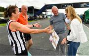 21 August 2021; Catherine and Johnny O'Sullivan from Galtee Runners AC, in Cork, greet their grandson Tomas O'Brien, their daughter Kelly and her partner Eamonn O'Brien, after both finishing second in the women's and men's 50 kilometre races, at the Irish National 50 kilometre and 100 kilometre Championships, incorporating the Anglo Celtic Plate, at Mondello Park in Naas, Kildare. Photo by Brendan Moran/Sportsfile
