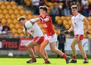 21 August 2021; Ronan Strain of Tyrone in action against Patrick O'Grady of Cork during the 2021 Electric Ireland GAA Football All-Ireland Minor Championship Semi-Final match between Cork and Tyrone at Bord Na Mona O'Connor Park in Tullamore, Offaly. Photo by Matt Browne/Sportsfile