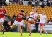 21 August 2021; Ronan Strain of Tyrone in action against Alan Kelleher of Cork during the 2021 Electric Ireland GAA Football All-Ireland Minor Championship Semi-Final match between Cork and Tyrone at Bord Na Mona O'Connor Park in Tullamore, Offaly. Photo by Matt Browne/Sportsfile