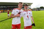 21 August 2021; Tyrone players Ronan Donnelly, left, and Matthew Mallon celebrate after the 2021 Electric Ireland GAA Football All-Ireland Minor Championship Semi-Final match between Cork and Tyrone at Bord Na Mona O'Connor Park in Tullamore, Offaly. Photo by Matt Browne/Sportsfile