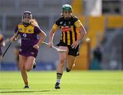 21 August 2021; Miriam Walsh of Kilkenny in action against Emma Walsh of Wexford during the All-Ireland Senior Camogie Championship quarter-final match between Kilkenny and Wexford at Páirc Uí Chaoimh in Cork. Photo by Piaras Ó Mídheach/Sportsfile