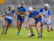 21 August 2021; Mairéad Eviston of Tipperary in action against Sarah Lacey of Waterford during the All-Ireland Senior Camogie Championship Quarter-Final match between Tipperary and Waterford at Páirc Uí Chaoimh in Cork. Photo by Piaras Ó Mídheach/Sportsfile