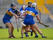 21 August 2021; Abby Flynn of Waterford in action against Julieanne Bourke, left, and Mairéad Eviston of Tipperary during the All-Ireland Senior Camogie Championship Quarter-Final match between Tipperary and Waterford at Páirc Uí Chaoimh in Cork. Photo by Piaras Ó Mídheach/Sportsfile