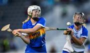 21 August 2021; Clodagh McIntyre of Tipperary shoots under pressure from Kate Lynch of Waterford during the All-Ireland Senior Camogie Championship Quarter-Final match between Tipperary and Waterford at Páirc Uí Chaoimh in Cork. Photo by Piaras Ó Mídheach/Sportsfile