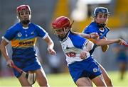 21 August 2021; Lorraine Bray of Waterford in action against Karen Kennedy, left, and Julieanne Bourke of Tipperary during the All-Ireland Senior Camogie Championship Quarter-Final match between Tipperary and Waterford at Páirc Uí Chaoimh in Cork. Photo by Piaras Ó Mídheach/Sportsfile
