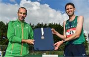 21 August 2021; David O’Keeffe of Togher AC, Cork, representing Ireland, is presented with his medal by John O'Regan, after finishing second in the national men's 100 kilometre race, at the Irish National 50 kilometre and 100 kilometre Championships, incorporating the Anglo Celtic Plate, at Mondello Park in Naas, Kildare. Photo by Brendan Moran/Sportsfile