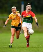 22 August 2021; Sara Doyle of Carlow in action against Áine Tubridy of Antrim during the TG4 All-Ireland Ladies Football Junior Championship Semi-Final match between Antrim and Carlow at Lannleire GFC in Dunleer, Louth. Photo by Ben McShane/Sportsfile