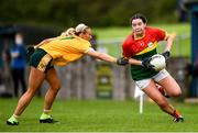 22 August 2021; Aoibhinn Gilmartin of Carlow evades the challenge of Áine Tubridy of Antrim during the TG4 All-Ireland Ladies Football Junior Championship Semi-Final match between Antrim and Carlow at Lannleire GFC in Dunleer, Louth. Photo by Ben McShane/Sportsfile