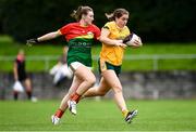 22 August 2021; Michelle Magee of Antrim in action against Caoimhe O'Neill of Carlow during the TG4 All-Ireland Ladies Football Junior Championship Semi-Final match between Antrim and Carlow at Lannleire GFC in Dunleer, Louth. Photo by Ben McShane/Sportsfile