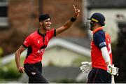 22 August 2021; Zubar Hassan Khan celebrates claiming the wicket of Brigade's David Barr, right, caught by team-mate Adam Hickey, during the Clear Currency All-Ireland T20 Cup Final match between Cork Harlequins and Brigade at Leinster Cricket Club in Dublin. Photo by Seb Daly/Sportsfile