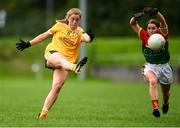 22 August 2021; Cathy Carey of Antrim is chased down by Ruth Bermingham of Carlow during the TG4 All-Ireland Ladies Football Junior Championship Semi-Final match between Antrim and Carlow at Lannleire GFC in Dunleer, Louth. Photo by Ben McShane/Sportsfile