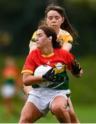 22 August 2021; Ruth Bermingham of Carlow in action against Aoife Taggart of Antrim during the TG4 All-Ireland Ladies Football Junior Championship Semi-Final match between Antrim and Carlow at Lannleire GFC in Dunleer, Louth. Photo by Ben McShane/Sportsfile
