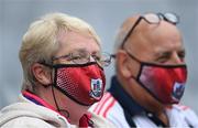 22 August 2021; Cork supporters, wearing face coverings, before the GAA Hurling All-Ireland Senior Championship Final match between Cork and Limerick in Croke Park, Dublin. Photo by Ramsey Cardy/Sportsfile