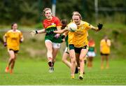 22 August 2021; Caoimhe O'Neill of Carlow in action against Ciara Brown of Antrim during the TG4 All-Ireland Ladies Football Junior Championship Semi-Final match between Antrim and Carlow at Lannleire GFC in Dunleer, Louth. Photo by Ben McShane/Sportsfile
