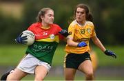 22 August 2021; Rachel Sawyer of Carlow in action against Niamh McIntosh of Antrim during the TG4 All-Ireland Ladies Football Junior Championship Semi-Final match between Antrim and Carlow at Lannleire GFC in Dunleer, Louth. Photo by Ben McShane/Sportsfile