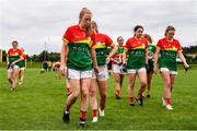 22 August 2021; Carlow players, including Nuala Mohan, 5, make their way off the pitch after their defeat in the TG4 All-Ireland Ladies Football Junior Championship Semi-Final match between Antrim and Carlow at Lannleire GFC in Dunleer, Louth. Photo by Ben McShane/Sportsfile