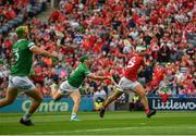 22 August 2021; Shane Kingston of Cork shoots to score his side's first goal despite the efforts of Seán Finn of Limerick during the GAA Hurling All-Ireland Senior Championship Final match between Cork and Limerick in Croke Park, Dublin. Photo by Eóin Noonan/Sportsfile