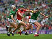 22 August 2021; Robbie O’Flynn of Cork is tackled by Kyle Hayes, left, and Gearóid Hegarty of Limerick during the GAA Hurling All-Ireland Senior Championship Final match between Cork and Limerick in Croke Park, Dublin. Photo by Ray McManus/Sportsfile