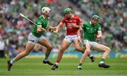 22 August 2021; Robbie O’Flynn of Cork is tackled by Kyle Hayes, left, and William O’Donoghue of Limerick during the GAA Hurling All-Ireland Senior Championship Final match between Cork and Limerick in Croke Park, Dublin. Photo by Ray McManus/Sportsfile