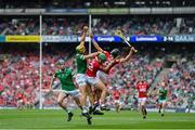 22 August 2021; Dan Morrissey of Limerick catches the sliothar ahead of Robbie O’Flynn, centre, and Darragh Fitzgibbon of Cork during the GAA Hurling All-Ireland Senior Championship Final match between Cork and Limerick in Croke Park, Dublin. Photo by Brendan Moran/Sportsfile