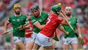 22 August 2021; Eoin Cadogan of Cork is tackled by Gearóid Hegarty of Limerick during the GAA Hurling All-Ireland Senior Championship Final match between Cork and Limerick in Croke Park, Dublin. Photo by Brendan Moran/Sportsfile