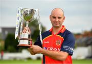 22 August 2021; Brigade captain Andrew Britton with the trophy after his side's victory over Cork Harlequins in their Clear Currency All-Ireland T20 Cup Final match at Leinster Cricket Club in Dublin. Photo by Seb Daly/Sportsfile